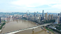 蓝云天空中近河现代城市鸟瞰