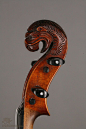 Musical Vision : Fun headstock on century old fiddle.