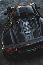 保时捷918 Spyder是一款由保时捷（Porsche）设计的中置引擎跑车，2010年3月在第80届日内瓦车展上作为一款概念车首次亮相，2013年9月配备米其林Pilot Sport Cup 2的918 Spyder原型车以6分57秒刷新了纽伯格林赛道单圈最佳记录[1-2]  。918 Spyder是插电式混合动力车型，搭载的3.4升V8发动机负责驱动后轮，而电动马达则驱动两个前轮。2011年3月，保时捷宣布将正式量产918 Spyder，仅限量生产918台，并于2