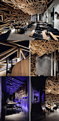 The 'Kido Sushi Bar' by DA Architects is such a visual treat, you’ll probably pay less attention to your food, beautiful geometric patterns made in wood adorn  the ceiling and continue all the way to the wall... READ MORE at Yanko Design !: 