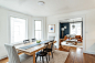 Large transitional medium tone wood floor kitchen/dining room combo photo in Detroit