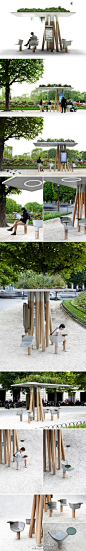 #景观物语#法国巴黎香榭丽舍大街，智能数字站//这个数字站可以遮挡阳光，为人们提供座椅，并提供高速的WIFI接入。其造型像由树 桩托起的绿色花园。精心打磨的混凝土座椅配有插座和休息小台面，方便人们放手， 或者书，或者笔记本。 http://t.cn/zjLFtuL