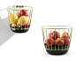 enamel canasta containers feature a wire cage | Designboom Shop : Add some style to your table and your home with Canasta, a series of enamel basket containers, black and white, enriched by a wire cage, in different metal finishes. Canasta is available in