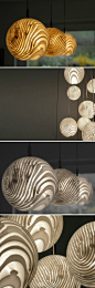 #DINZ灯具#圆球指纹灯罩-这个创意性的家居装饰天花板垂饰灯罩来自以色列设计师Dan Yeffet，命名为Detail.MGX，这个灯运用了设计者的指纹，让灯光能够从指纹缝中穿过。@德国室内设计网书店