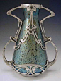 Loetz irridescent glass vase with pewter Art Nouveau mount. 1905