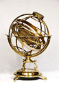 Richard Glynne (18th century)  Armillary sphere-orrery, ca. 1720  This instrument is a combination of an armillary sphere and a new kind of planetarium called an orrery. It demonstrates the structure of the Copernican universe.: 