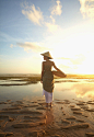 Pacific Islander woman walking in rice paddy by Gable Denims on 500px