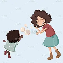 母亲和女儿正在制作肥皂泡。