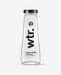 Clear Glass Water Bottle Mockup. Present your design on this mockup. Simple to change the color of different parts and add your design. Includes special layers and smart objects for your creative works. Tags: alkaline, alkaline water, bottle, clear glass,