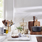 The kitchen is for mixing, after all! Brass, marble, cast iron and wood- now this is a beautiful mix. Tap the link in bio to shop this gold and marble kitchen!