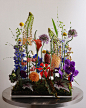 Photo by grove official / 그로브 on May 27, 2024. May be an image of flower arrangement, lily of the Nile, amaranth and text.