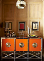 The orange and metal cabinet is genius!: