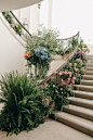 A Flower-Filled Wedding Ceremony in Beverly Hills - Amazing flower filled staircase decor