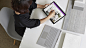 女人使用 Surface 触控笔在 Surface Book 2 显示屏上写字。