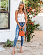 Kylo Smocked Peplum Crop Tank - Natural : Fitted 100% Rayon Hand Wash Cold, Dry Flat Rounded V-Neckline Adjustable Spaghetti Straps Smocked Body Crepey Fabrication No Closures Not Lined A chic outfit is easy in our Kylo Smocked Peplum Crop Tank! This natu