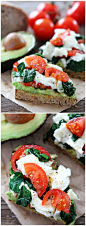 Avocado Toast with Eggs, Spinach, and Tomatoes Recipe on twopeasandtheirpod.com. This easy and healthy recipe is great for breakfast, lunch, dinner, or snack time!: 