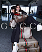 Photo shared by GUCCI on September 30, 2023 tagging @kendalljenner, @sabatods, @nameisriccardo, @badbunnypr, @alastairmckimm, and @anthonyseklaoui. May be an image of 4 people, suitcase, luggage, briefcase, magazine and text.