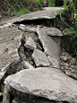 Broken Road. A narrow road destroyed by an earthquake or landslide , #ad, #narrow, #Road, #Broken, #road, #landslide #ad