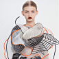 Garments influenced by distorted digital drawings featuring 3D-printed elements.: Garments influenced by distorted digital drawings featuring 3D-printed elements.