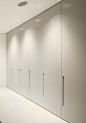 floor to ceiling wardrobes (closets) inside the Villa Escarpa by Mario Martins  Wardrobe door are a good choice SIMPLE