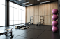 Ladies’ Fitness Center Interior Design 11 - The wood wall cladding works perfectly with the black floor and ceiling, achieving the minimalist feel for a gym room in the ladies fitness center, in addition to the floor to ceiling window that provide adequat