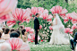 Giant painted flower ceremony decor. Gorgeous!