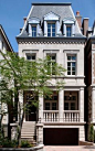 Mansard Roof Definition and Advantages - Exquisite French home features underground garage.