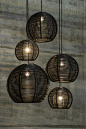 Black Bamboo ball lanterns ! these work perfect with Kuba Cloth Pillows ! www.MIXfurniture.com