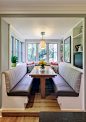 Kitchen/dining room combo - mid-sized transitional medium tone wood floor and brown floor kitchen/dining room combo idea in Baltimore with green walls and no fireplace