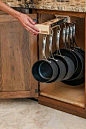 I like this a lot! Wonder where the lids are... Pots...Storage need something like this for real: 