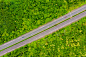摄图网_501327540_航拍树木环绕的高速公路（非企业商用）