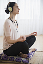 Caucasian woman meditating - stock photo