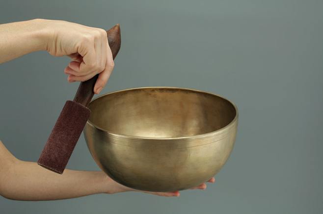 person holding brass...