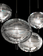 Jefferson, design by Luca Nichetto, 2019 : Luca Nichetto 受上世纪六十年代迷幻视觉艺术的音乐和图案的启发设计了吊灯Jefferson。灯罩上装饰的漩涡图案因波西米亚水晶的永恒古典主义更显精美珍贵，将迷人的光线散发开来。Jefferson吊灯具有不同尺寸和多种组成的动态变化，精美雅致的同时更良好利用了内置LED 灯的出色性能。