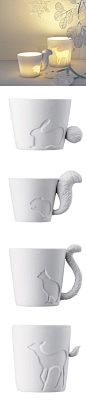 So cute its not even funny. These are mugs? Or candle holders apparently.