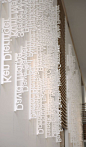 Very ingenious use of laser-cut styrofoam names. The headquarters of Ziba Design, a design consultancy in Portland. The lobby features an installation of employee names laser-cut from wafers of Styrofoam and hung vertically according to date hired.