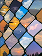 This may contain: an image of the sky and clouds through a stained glass window