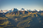 brown and white mountains under blue sky during daytime