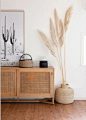 Love this hallway with its desert boho vibes - all you need is pampas grass and a rattan cupboard
