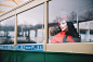 1950s-style woman on a Paris street car, photograph by Eve Saint Ramon