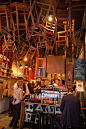 Brother Baba Budan | Melbourne. Hanging a menagerie of chairs from the ceiling as a design element. interesting!