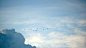 birds flying over the mountain during daytime