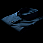 w_gcd_A_shirt_folded_front_blue_simple_pure_black_background_da4ca99a-f224-403e-a61b-29a505c2c963