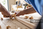 'Sweden, Man planning wood in workshop'_创意图片