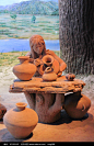 仰韶文化原始人制陶雕塑图片