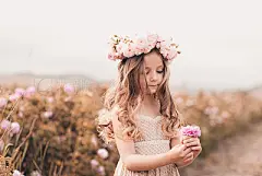 Cute kid girl posing outdoors