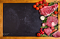 Raw meat steaks on a dark background ready to roasting by Elena Yeryomenko on 500px