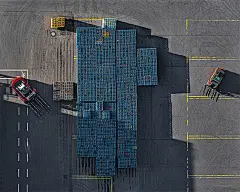 CRATE STACKS : The view from above on the rows of piles, consisting of thousands of colorful crates, reminds on the computer game tetris or graphic bar diagrams.The beverage production is part of the food and beverage industry.The beverage industry in Ger