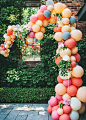 Fresh floral and balloon garland for the guest's photobooth. #bridalshower #petiteandsweet
