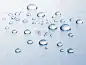 Water drops isolated. Bluish color.
